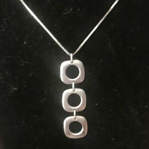 Tiffany & Co. Silver Tripple Three cushion drop dangle necklace.